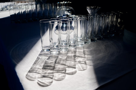 Shadow of empty glassware, sunshine throughの写真素材