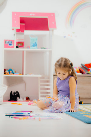 Enjoying Creative Playtime in a Colorful and Cheerful Childs Room Full of Inspirationの写真素材