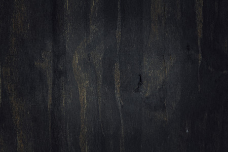 Background of dark wooden strips with slight signs of agingの写真素材