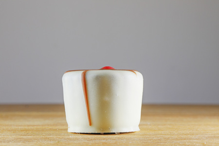 Sweet white chocolate on wooden backgroundの写真素材