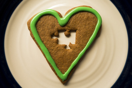 A cinnamon heart with a jigsaw-puzzle piece misingの写真素材
