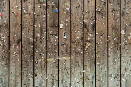 Old bulletin board with pins and staplesの写真素材