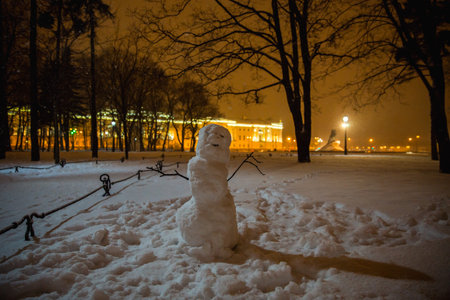 snowman at night in the park of st. petersburg winterの写真素材