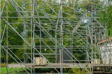 Metal structures on a small abandoned stage side viewの写真素材