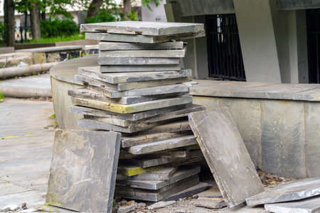 Granite square tiles lie on top of each other pillarの写真素材