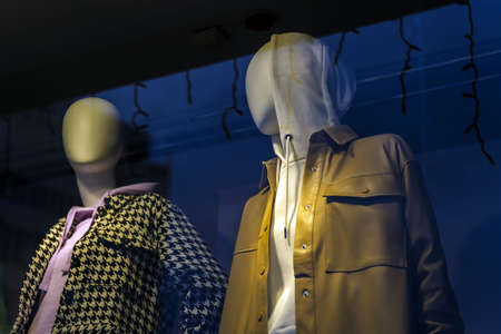 Mannequin in a yellow leather jacket with a large breast pocket
