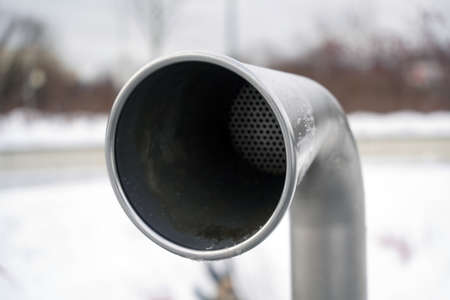 Socket of the intercom pipe made of metal with a grille insideの写真素材