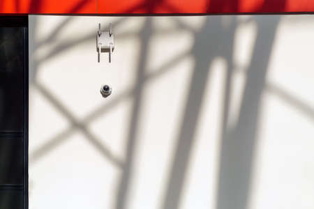 Surveillance camera and wifi router on the wallの写真素材