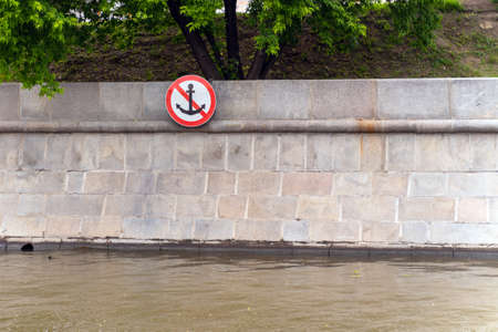 Sign parking of river vessels is prohibited on the concrete bank of the riverの写真素材
