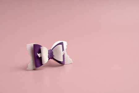 Bow for hair on a pink backgroundの写真素材
