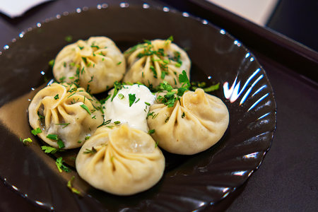 Oriental dish of manta with sour cream and herbsの写真素材