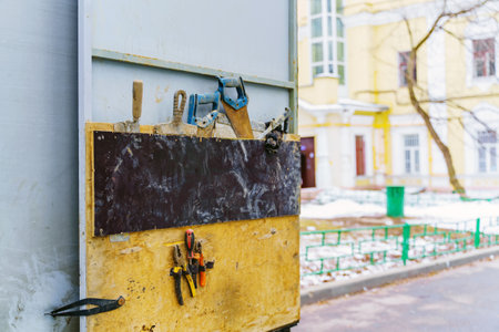 Various joinery and locksmith tools are attached to the door of the cargo vanの写真素材