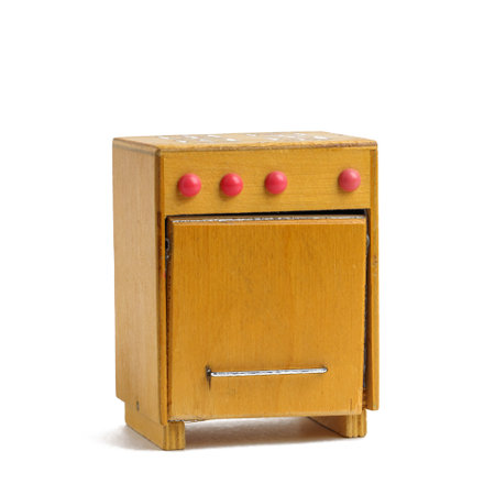 Vintage toy gas stove made of woodの写真素材