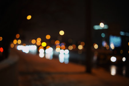 Wallpaper. Blurry image of the road and houses in the city at night