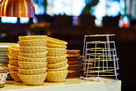 Various plates and devices for setting the table in the restaurant are on the tableの写真素材