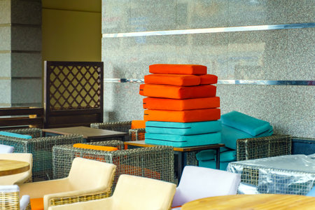 The furniture of the outdoor cafe is preparing for the start of the seasonの写真素材