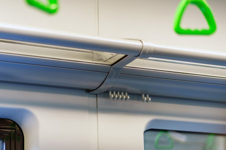 Special hooks for clothes and bags in the train and subway carの写真素材