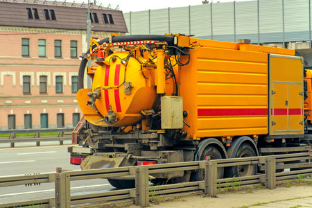 The emergency vehicle of water transport communications is on the roadの写真素材