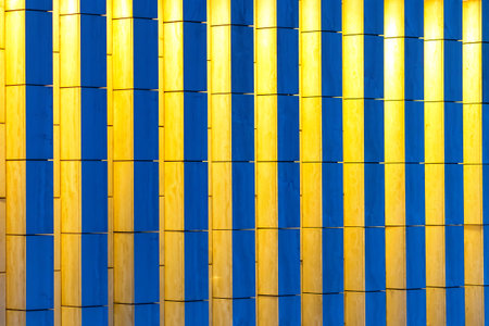 Texture square concrete pillars with yellow and blue lightingの写真素材