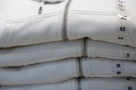 Gray hoodies lie on top of each otherの写真素材