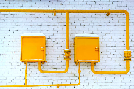 Pipes and boxes of the gas distribution system in a residential buildingの写真素材