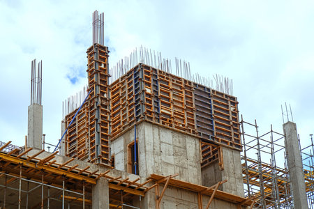 Exterior formwork on concrete building under constructionの写真素材