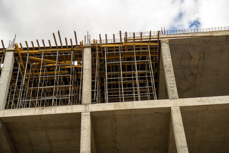 Internal supporting structures made of metal in concrete building under construction