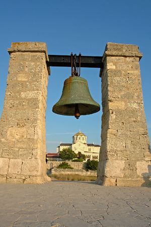 The big bell on a background of the Cathedral in Chersonese near Sevastopol                               の写真素材