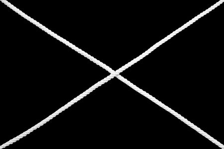 The letter "x" from a linen cordの写真素材