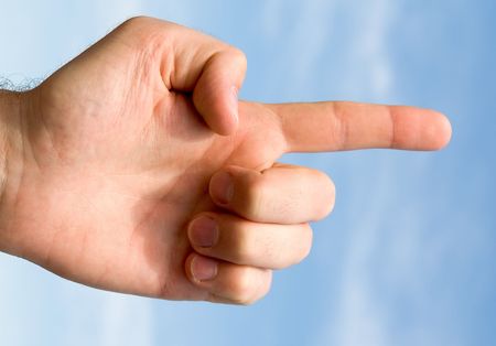 finger. hand gesture with blue sky at backgroundの写真素材