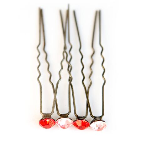 Hairpins with a ruby on a white backgroundの写真素材