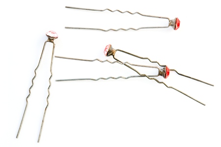 Hairpins with a ruby on a white backgroundの写真素材