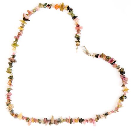 necklace in the shape of a heart on a white backgroundの写真素材