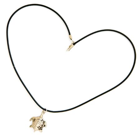 turtle pendant. lace in the shape of a heart on a white backgroundの写真素材