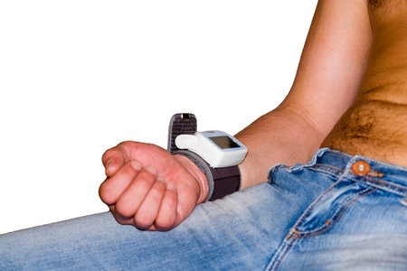 tonometer on a hand, isolated on whiteの写真素材