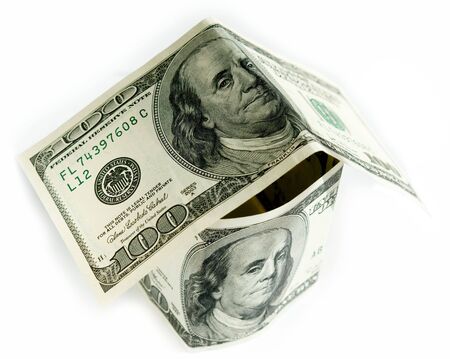 dollar house on a white backgroundの写真素材