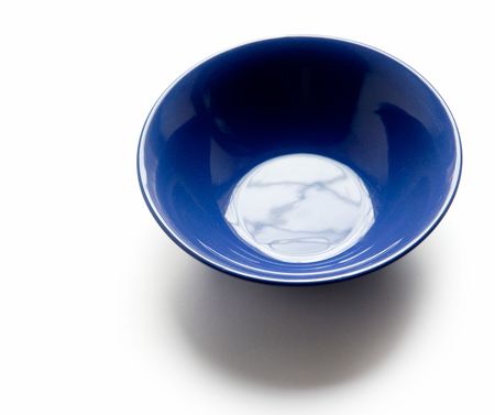 Dark blue plate on a white backgroundの写真素材