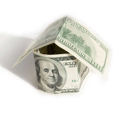dollar house on a white backgroundの写真素材