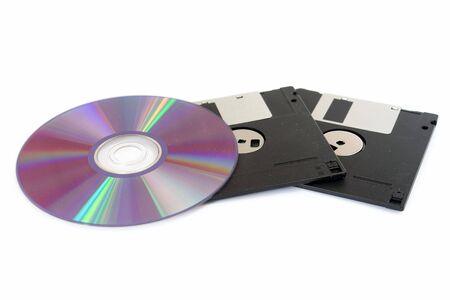 CD and floppy disk isolated on whiteの写真素材