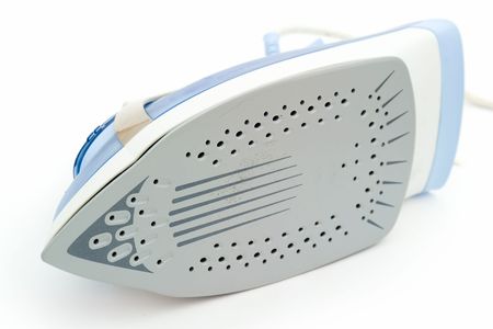 electric iron on a white backgroundの写真素材