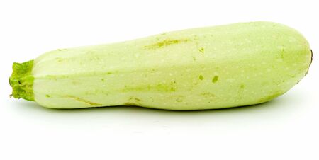 The vegetable marrow on a white background.の写真素材