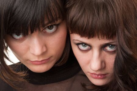 Serious girls. Closeup of a young women.
