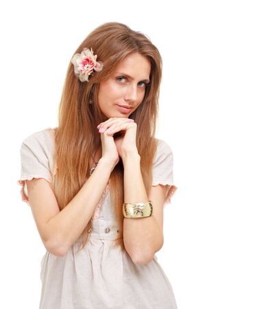 beautiful young woman standing against isolated white backgroundの写真素材