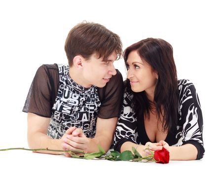 Seduction. Happy couple on a white background.の写真素材