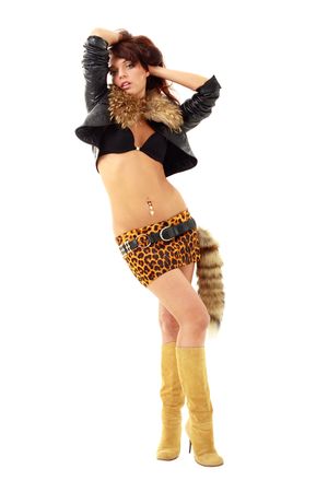 Amazonian. Sexy wild woman standing on a white background.の写真素材