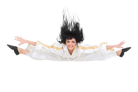 Juming dancer makes split against isolated white backgroundの写真素材