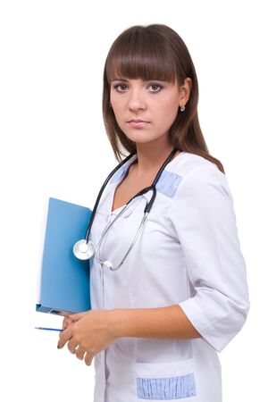 Serious doctor with stethoscope and folder, isolated on a white background with copyspaceの写真素材