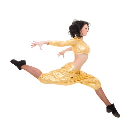 Attractive young dancer jumping against isolated white backgroundの写真素材