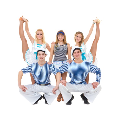 Dance team in sailor uniform posing against isolated white backgroundの写真素材
