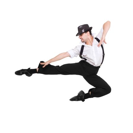 Young dancer jumping against isolated white backgroundの写真素材